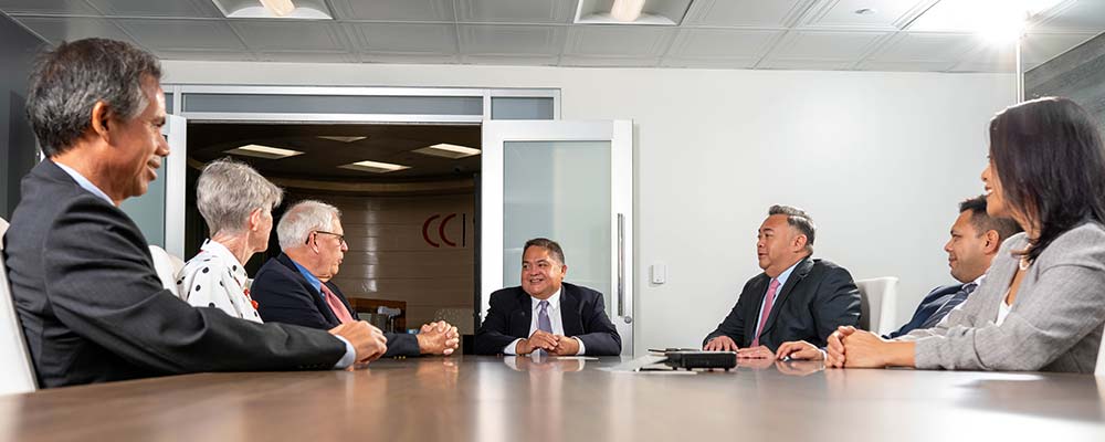 attorneys of Camacho Calvo Law Group LLC at conference table